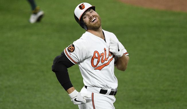 Baltimore Orioles' Chris Davis reacts after he lined out during the third inning of a baseball game against the Oakland Athletics, Monday, April 8, 2019, in Baltimore. (AP Photo/Nick Wass)