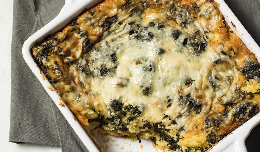 This undated photo provided by America's Test Kitchen in March 2019 shows Breakfast Strata in Brookline, Mass. This recipe appears in the cookbook “Vegetables Illustrated.” (Steve Klise/America's Test Kitchen via AP)