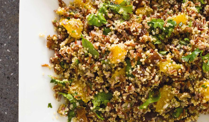 This undated photo provided by America's Test Kitchen in March 2019 shows Red Rice and Quinoa Salad in Brookline, Mass. This recipe appears in the cookbook "Vegan for Everybody." (Carl Tremblay/America's Test Kitchen via AP)
