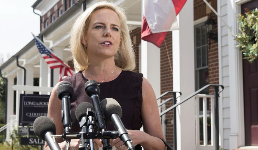 Homeland Security Secretary Kirstjen Nielsen talks outside her home in Alexandria, Va., on Thursday, April 8, 2019. Nielsen says she continues to support the president’s goal of securing the border in her first public remarks since her surprise resignation.  (AP Photo/Kevin Wolf)