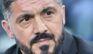 Milan head coach Gennaro Gattuso looks on during the Italian Serie A soccer match between Juventus and AC Milan at the Allianz Stadium in Turin, Italy, Saturday, April 6, 2019.  (Alessandro Di Marco/ANSA via AP)
