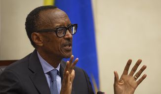 Rwanda&#39;s President Paul Kagame answers questions from the media at a press conference at a convention center in the capital Kigali, Rwanda, Monday, April 8, 2019. Rwanda on Sunday commemorated the 25th anniversary of when the country descended into an orgy of violence in which some 800,000 Tutsis and moderate Hutus were massacred by the majority Hutu population over a 100-day period in what was the worst genocide in recent history. (AP Photo/Ben Curtis)