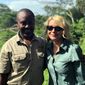 Image released by Wild Frontiers tour company on Monday April 8, 2019, shows American tourist Kim Endicott, right, and field guide Jean-Paul Mirenge a day after they were rescued following a kidnap by unknown gunmen in Uganda&#x27;s Queen Elizabeth National Park. Ugandan police said on Sunday they had rescued Endicott, an American tourist, and her guide, Mirenge, who had been kidnapped by gunmen in a national park. (Wild Frontiers via AP)