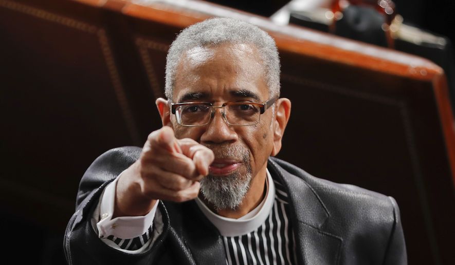 Rep. Bobby Rush, D-Ill., points to guests in the balcony as he takes his seat on Capitol Hill in Washington, Tuesday, Feb. 28, 2017, before President Donald Trump's speech to a joint session of Congress. (AP Photo/Pablo Martinez Monsivais) ** FILE **