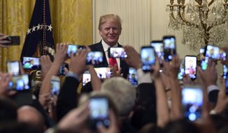 President Donald Trump arrives to speak during a Hispanic Heritage Month Celebration in the East Room of the White House in Washington, Monday, Sept. 17, 2018. (AP Photo/Susan Walsh) ** FILE **
