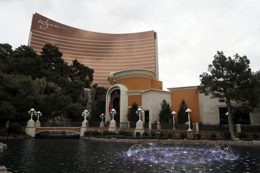 FILE - This Feb. 19, 2018, file photo, shows Wynn Las Vegas in Las Vegas. Las Vegas casino giant Wynn Resorts is in talks to buy Australia&#x27;s largest casino operator, Crown Resorts. Crown, which owns casinos in Melbourne, Perth and London and will soon open another in Sydney, confirmed in a statement on Tuesday, April 9, 2019 it was in confidential takeover discussions over a cash-and-scrip offer from Wynn. (AP Photo/Isaac Brekken, File)
