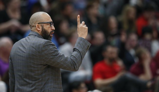 New York Knicks coach David Fizdale gestures during the first half of the team&#x27;s NBA basketball game against the Chicago Bulls on Tuesday, April 9, 2019, in Chicago. (AP Photo/Kamil Krzaczynski)
