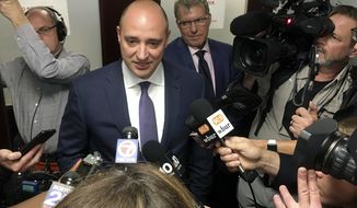 FILE - In this April 27, 2018 file photo, new Wynn Resort CEO Matthew Maddox speaks to members of the media after a hearing in Boston. Maddox said executive vice president of corporate security James Stern was informed Saturday, April 6, 2019, that the company would &amp;quot;no longer require his services,&amp;quot; after he acknowledged spying on employees following allegations of sexual misconduct against company founder Steve Wynn. (AP Photo/Philip Marcelo, File)