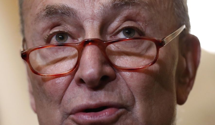 Senate Minority Leader Sen. Chuck Schumer of N.Y., speaks to members of the media following a Senate policy luncheon, Tuesday, April 2, 2019, on Capitol Hill in Washington. (AP Photo/Patrick Semansky)