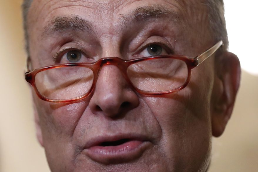 Senate Minority Leader Sen. Chuck Schumer of N.Y., speaks to members of the media following a Senate policy luncheon, Tuesday, April 2, 2019, on Capitol Hill in Washington. (AP Photo/Patrick Semansky)