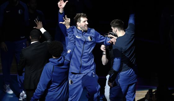 Dallas Mavericks&#39; Dirk Nowitzki (41) is introduced for the team&#39;s NBA basketball game against the Phoenix Suns in Dallas, Tuesday, April 9, 2019. (AP Photo/Tony Gutierrez)