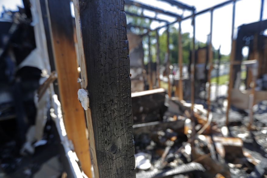 The burnt ruins of the Greater Union Baptist Church, one of three that recently burned down in St. Landry Parish, are seen in Opelousas, La., Wednesday, April 10, 2019. (AP Photo/Gerald Herbert) **FILE**