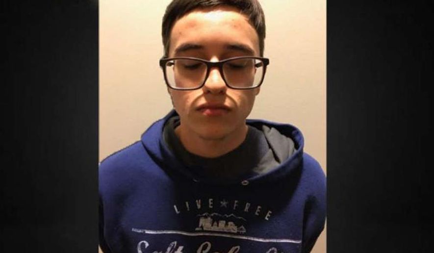 This photo provided by San Antonio Police Department shows Matthew Dempsey. San Antonio police say Dempsey was arrested Tuesday, April 9, 2019 for the death of his mother, Mary Dempsey, and 18-year-old Daniel Saucedo was arrested Wednesday. An arrest affidavit says the teenagers attacked Mary Dempsey when she walked in on them burglarizing her home. (San Antonio Police Department/The San Antonio Express-News via AP)