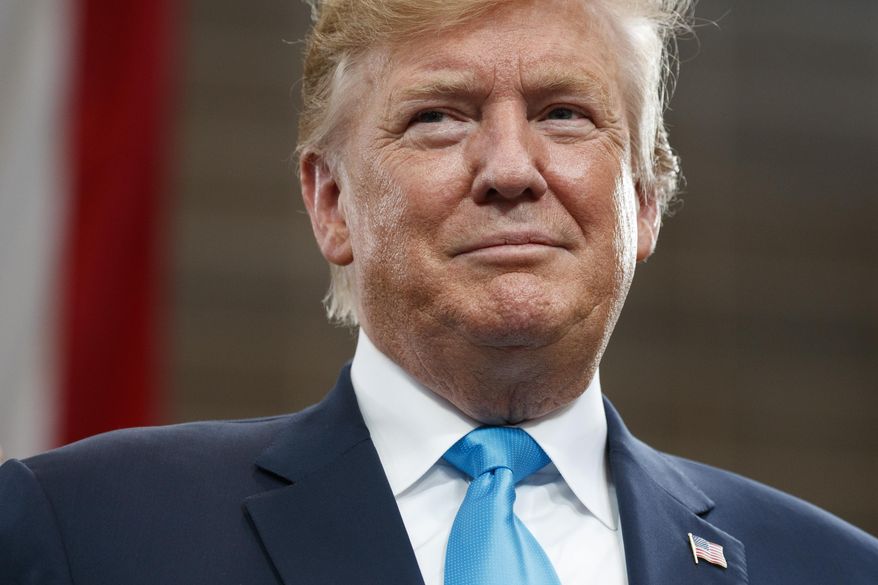 President Donald Trump arrives to speaks about energy and infrastructure at the International Union of Operating Engineers International Training and Education Center, Wednesday, April 10, 2019, in Crosby, Texas. (AP Photo/Evan Vucci)