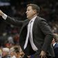 Washington Wizards head coach Scott Brooks directs his team during the first half of an NBA basketball game against the Utah Jazz, Friday, March 29, 2019, in Salt Lake City. (AP Photo/Rick Bowmer) **FILE**