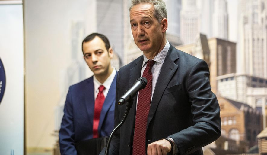 Joseph Lipari, deputy inspector general for Public Safety, looks on as Chicago Inspector General Joe Ferguson discusses the audit of the Chicago Police Department's "gang database" during press conference at City Hall, Thursday, April 11, 2019. (Ashlee Rezin/Chicago Sun-Times via AP)