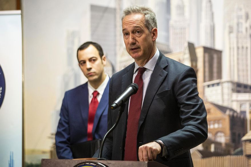 Joseph Lipari, deputy inspector general for Public Safety, looks on as Chicago Inspector General Joe Ferguson discusses the audit of the Chicago Police Department's "gang database" during press conference at City Hall, Thursday, April 11, 2019. (Ashlee Rezin/Chicago Sun-Times via AP)
