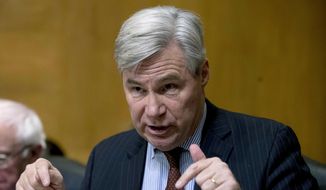 In this Jan. 16, 2019, file photo, Sen. Sheldon Whitehouse, D-R.I., asks questions in a hearing on Capitol Hill in Washington. (Associated Press) **FILE**