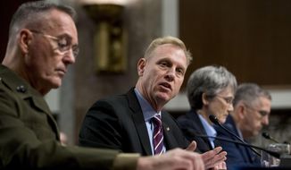 Acting Defense Secretary Patrick Shanahan, second from left, accompanied by Joint Chiefs Chairman Gen. Joseph Dunford, left, Secretary of the Air Force Heather Wilson, second from right, and U.S. Strategic Command Commander Gen. John Hyten, right, speaks during a Senate Armed Services Committee hearing on Capitol Hill in Washington , Thursday, April 11, 2019, on the proposed Space Force. (AP Photo/Andrew Harnik)