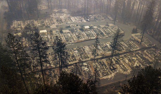 FILE - In this Thursday, Nov. 15, 2018, file photo, residences leveled by the wildfire line a neighborhood in Paradise, Calif. More than 2.7 million Californians live in areas that are at very high risk for wildfires. One in 12 homes in California are at high risk of burning in a wildfire. The more information we can share about where and how we&#x27;re falling short, the quicker we can come together on potential solutions. (AP Photo/Noah Berger, File)