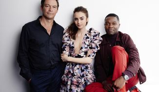 This April 8, 2019 photo shows actors Dominic West, from left, Lily Collins, and David Oyelowo posing for a portrait in New York to promote their PBS mini-series &amp;quot;Les Miserables,&amp;quot; premiering on Sunday. (Photo by Taylor Jewell/Invision/AP)
