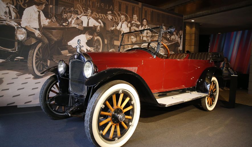 The "Hupmobile" is displayed at the annual NFL football owners meetings, Monday, March 25, 2019, in Phoenix. Fifteen men were ready to launch the 10 charter teams of the National Football League in 1920. They gathered in Ralph Hay’s car showroom in Canton, Ohio, and got down to business. Except for one problem: There weren’t enough chairs for everyone. Instead, a few of the future owners of NFL franchises sat on the running boards of the Hupmobile in Hay’s dealership. And when they were ready to sign the papers to establish the league, they leaned on the hood of the car to finish up.(AP Photo/Rick Scuteri)