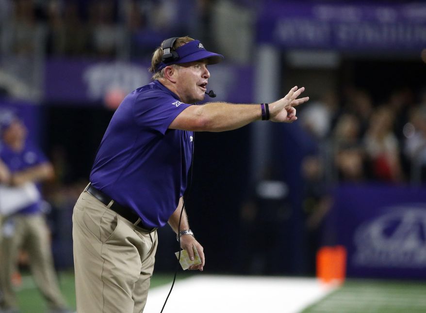 FILE - In this Sept. 15, 2018, file photo, TCU coach Gary Patterson directs his team against Ohio State during the first half of an NCAA college football game in Arlington, Texas. Patterson said TCU went through much of spring practice with only about half of an 85-player scholarship roster. That gap was created by injuries and about 20 spots that will be filled when the rest of the 2019 recruiting class and some graduate transfers arrive in the summer. (AP Photo/Michael Ainsworth, File)
