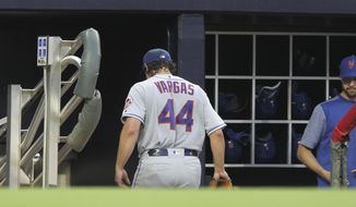 New York Mets pitcher Jason Vargas enter the dugout after pulled from the team&#39;s baseball game against the Atlanta Braves during the first inning Saturday, April 13, 2019, in Atlanta. (AP Photo/Tami Chappell)