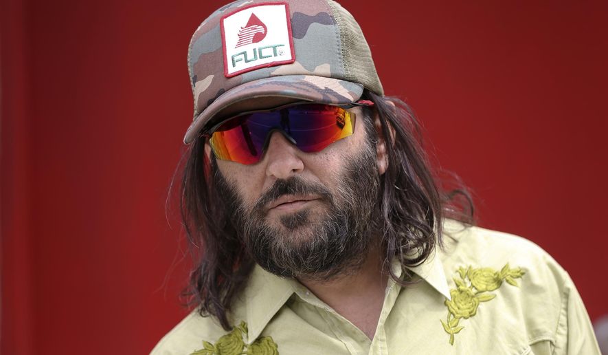 Los Angeles artist Erik Brunetti, the founder of the streetwear clothing company &amp;quot;FUCT,&amp;quot; poses for a photo in Los Angeles Thursday, April 11, 2019. (AP Photo/Damian Dovarganes) ** FILE **