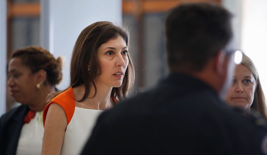 Former FBI lawyer Lisa Page, left, arrives for a closed-door interview with the House Judiciary and House Oversight committees, Monday, July 16, 2018, on Capitol Hill in Washington. (AP Photo/Jacquelyn Martin) ** FILE **