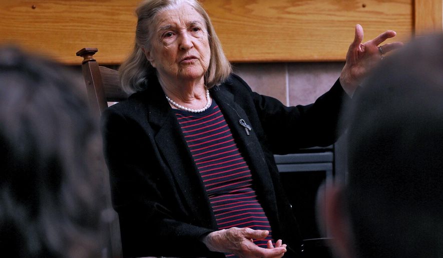In a April 4, 2019 photo, holocaust survivor Trudy Blumenstein shares her story at the home of Mike and Laura Dattner in Dublin, Ohio. Jewish Columbus calls this event Zikaron Basalon, which translates as "remembrance in the living room." (Eric Albrecht/The Columbus Dispatch via AP)