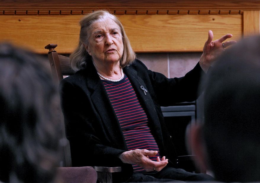 In a April 4, 2019 photo, holocaust survivor Trudy Blumenstein shares her story at the home of Mike and Laura Dattner in Dublin, Ohio. Jewish Columbus calls this event Zikaron Basalon, which translates as "remembrance in the living room." (Eric Albrecht/The Columbus Dispatch via AP)