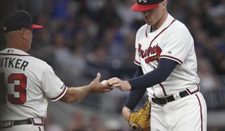Atlanta Braves&#39; Sean Newcomb is pulled by manager Brian Snitker during the second inning against the New York Mets in a baseball game Saturday, April 13, 2019, in Atlanta. (AP Photo/Tami Chappell)