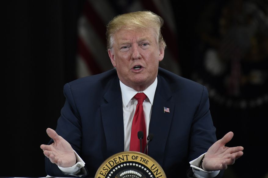 President Donald Trump speaks at Nuss Truck and Equipment in Burnsville, Minn., Monday, April 15, 2019, during an event on taxes. (AP Photo/Susan Walsh)