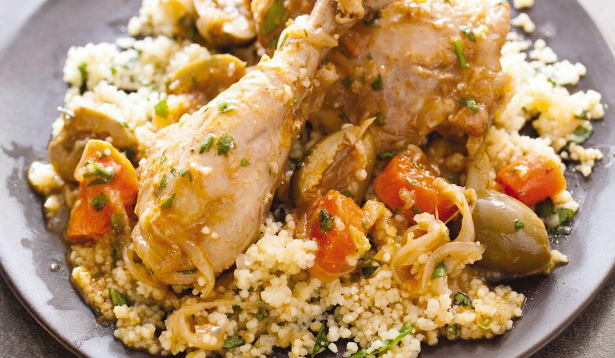 This undated photo provided by America's Test Kitchen in April 2019 shows Chicken Tagine with Olives and Lemon in Brookline, Mass. This recipe appears in the cookbook “How to Braise Everything.” (Carl Tremblay/America's Test Kitchen via AP)
