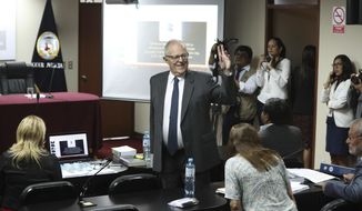 Peru&#39;s former President Pedro Pablo Kuczynski arrives for a court hearing to determine his release, in Lima, Peru, Monday, April 15, 2019. A judge in Peru ordered last week the detention for 10 days of the former leader as part of a money laundering probe into his consulting work for the company at the heart of Latin America&#39;s biggest graft scandal. (AP Photo/Martin Mejia)