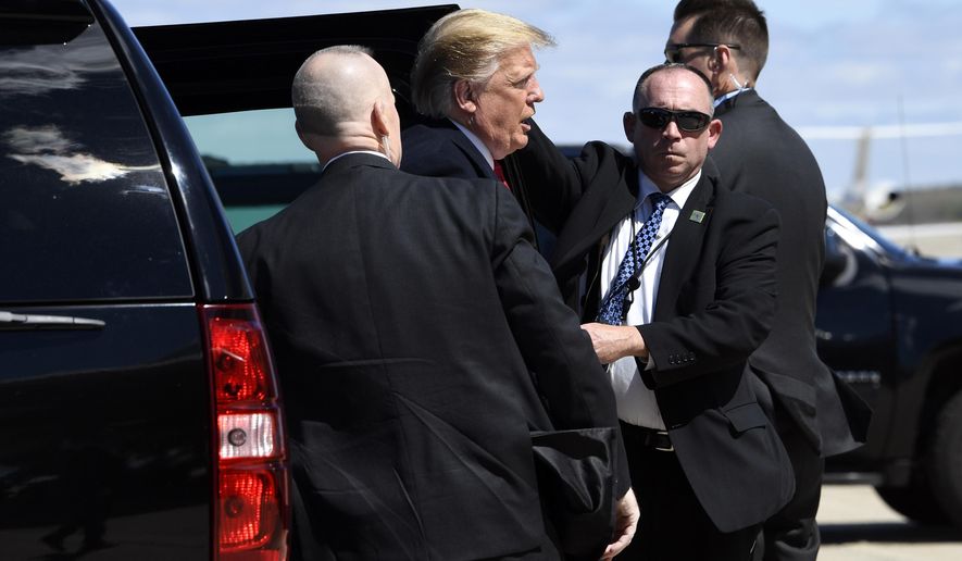 President Donald Trump gets out of his vehicle as he heads to board Air Force One at Andrews Air Force Base, Md., Monday, April 15, 2019. Trump is heading to Minnesota for an event on tax day. (AP Photo/Susan Walsh)