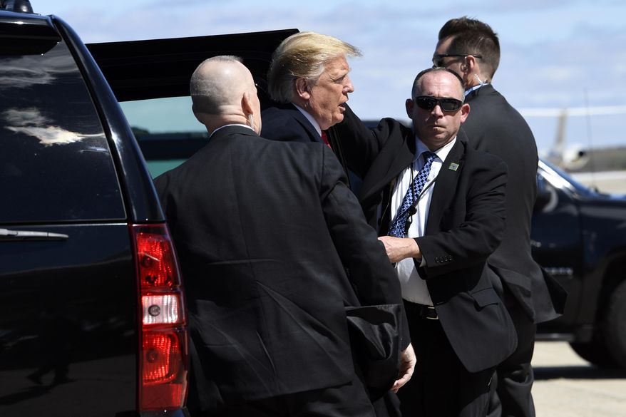 President Donald Trump gets out of his vehicle as he heads to board Air Force One at Andrews Air Force Base, Md., Monday, April 15, 2019. Trump is heading to Minnesota for an event on tax day. (AP Photo/Susan Walsh)