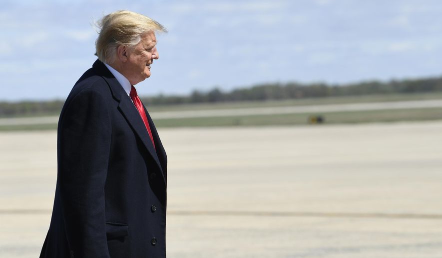 President Donald Trump walks towards the steps of Air Force One at Andrews Air Force Base in Md., Monday, April 15, 2019. Trump is heading to Minnesota for a tax day event. (AP Photo/Susan Walsh)