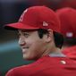 Los Angeles Angels&#39; Shohei Ohtani, of Japan, smiles in the dugout before the team&#39;s baseball game against the Milwaukee Brewers, Wednesday, April 10, 2019, in Anaheim, Calif. (AP Photo/Jae C. Hong)