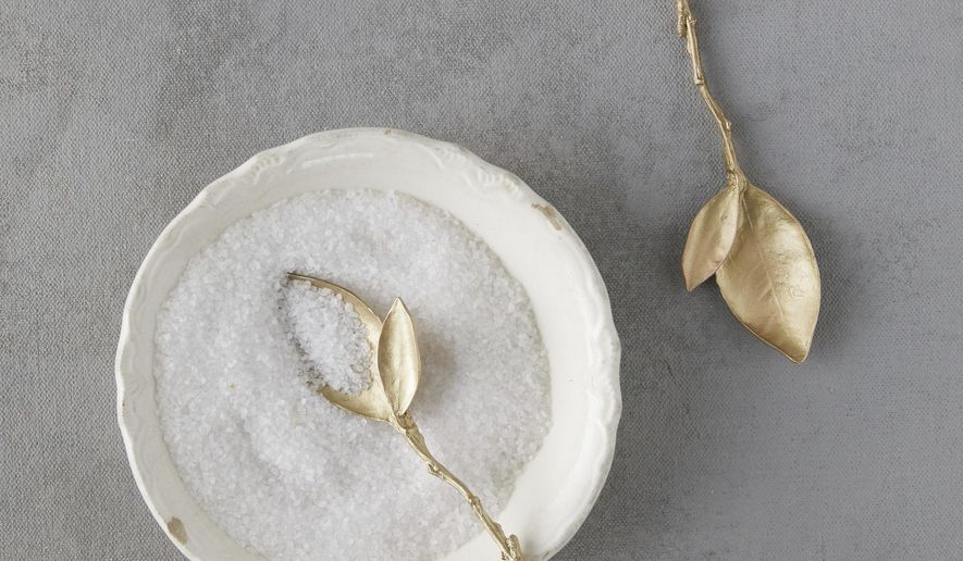 This photo provided by Terrain shows Michael Michaud's delicately crafted metal spoons made using molds and natural botanical material. At Terrain, find orange blossom teaspoons, gingko napkin rings and calla lily spoons. (Terrain via AP)