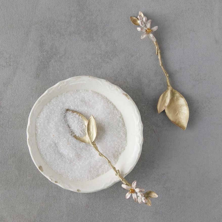 This photo provided by Terrain shows Michael Michaud's delicately crafted metal spoons made using molds and natural botanical material. At Terrain, find orange blossom teaspoons, gingko napkin rings and calla lily spoons. (Terrain via AP)