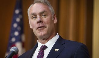 FILE - In this Dec. 11, 2018 file photo, then-Secretary of the Interior Ryan Zinke speaks at EPA headquarters in Washington. Zinke has landed a more than $100,000-a-year job with a Nevada gold-mining firm. Zinke confirmed by phone Tuesday, April 16, he has accepted a consulting and board position with U.S. Gold Corp., a company with business before Zinke&#39;s former agency, the Interior Department. (AP Photo/Cliff Owen, File)
