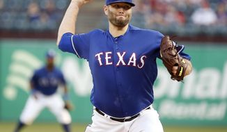 Texas Rangers starting pitcher Lance Lynn (35) throws against the Los Angeles Angels during the first inning of a baseball game Wednesday, April 17, 2019, in Arlington, Texas. (AP Photo/Michael Ainsworth)
