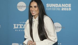 FILE - In this Tuesday, Jan. 29, 2019 file photo, actress Demi Moore poses at the premiere of the film &amp;quot;Corporate Animals&amp;quot; during the 2019 Sundance Film Festival, in Park City, Utah. Nine years after her book deal was first announced, Moore is ready to release a memoir her publisher calls “deeply candid and insightful.” Moore’s “Inside Out” is scheduled for September 24, HarperCollins announced Wednesday, April 17, 2019. (Photo by Danny Moloshok/Invision/AP, File)