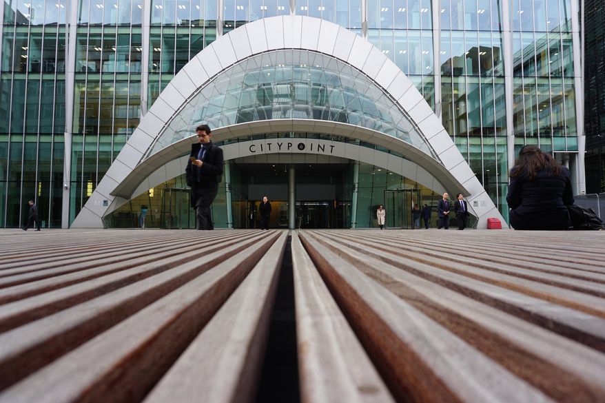 This Tuesday, March 5, 2019, file photo shows an entrance to the skyscraper that houses the London office of Israeli private investigation firm Black Cube. The company drew international criticism for its work protecting the reputation of disgraced Hollywood mogul Harvey Weinstein. (AP Photo/Raphael Satter) ** FILE **