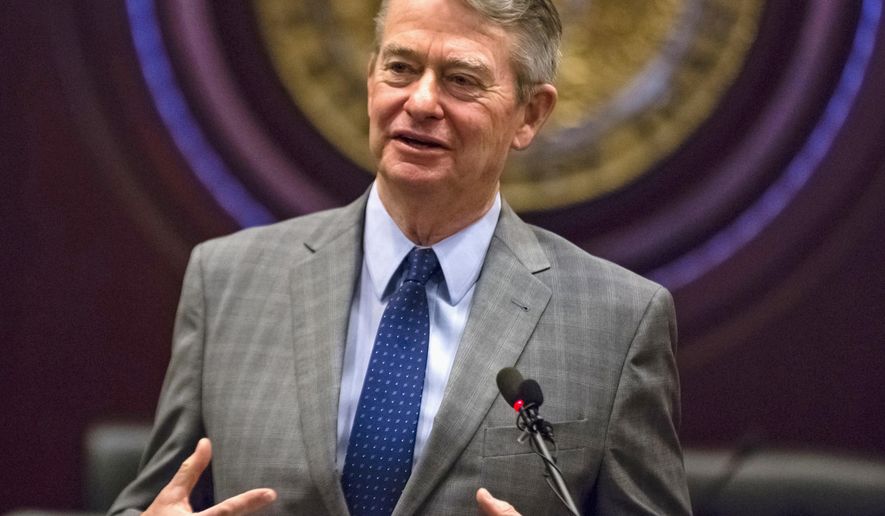 FILE - In this Jan. 3, 2019 photo, Idaho Gov.-elect Brad Little answers a reporter's question at the State Capitol building in Boise, Idaho. Republican Gov. Brad Little says Idahoans can trust him to do the right thing after the Legislature handed him sweeping authority to eliminate thousands of state-approved rules going back decades that touch on just about every aspect of daily life. Little on Tuesday, April 16, said he doesn't view the unusual power handed the executive branch this year as an opportunity to do mischief. (AP Photo/Otto Kitsinger, File)