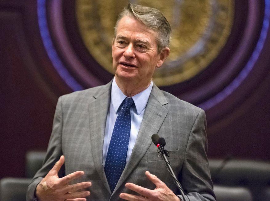 FILE - In this Jan. 3, 2019 photo, Idaho Gov.-elect Brad Little answers a reporter's question at the State Capitol building in Boise, Idaho. Republican Gov. Brad Little says Idahoans can trust him to do the right thing after the Legislature handed him sweeping authority to eliminate thousands of state-approved rules going back decades that touch on just about every aspect of daily life. Little on Tuesday, April 16, said he doesn't view the unusual power handed the executive branch this year as an opportunity to do mischief. (AP Photo/Otto Kitsinger, File)