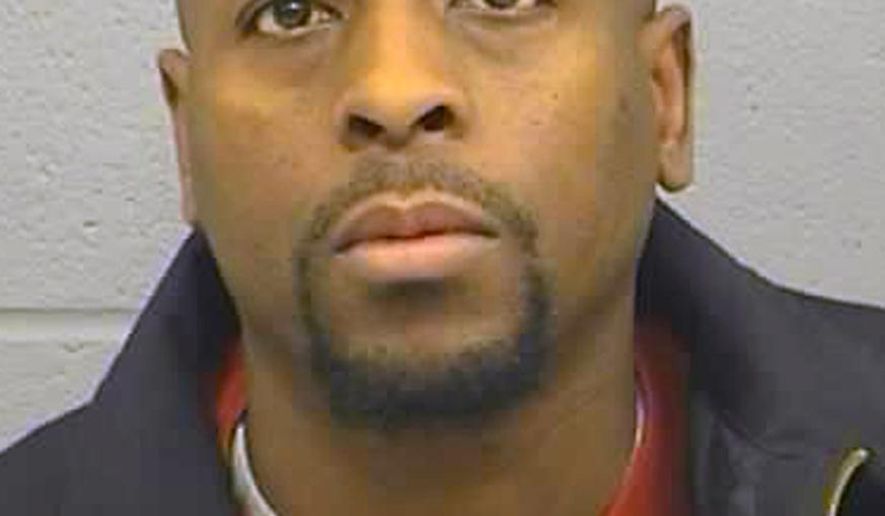 FILE--In this Feb. 26, 2016, booking file photo provided by the Harvey County Sheriff's Office shows Cedric Ford. The families of victims in a 2016 mass shooting in central Kansas have won a $2 million settlement from the now-defunct pawn shop that sold the guns to the shooter, Cedric Ford's girlfriend, Sarah Hopkins. The settlement of three lawsuits in Harvey County District Court was announced Wednesday by Brady, a national center against gun violence. Victims' families argued that the pawn shop should have known that shooter's girlfriend was a straw buyer. (Harvey County Sheriff's Office via AP)
