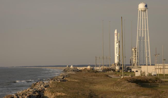 This photo provided by NASA shows the Northrop Grumman Antares rocket, with Cygnus resupply spacecraft onboard  on Pad-0A, Wednesday, April 17, 2019 at NASA&#x27;s Wallops Flight Facility in Virginia. The cargo resupply mission for NASA to the International Space Station will deliver about 7,600 pounds of science and research, crew supplies and vehicle hardware to the orbital laboratory and its crew. (Bill Ingalls/NASA via AP)